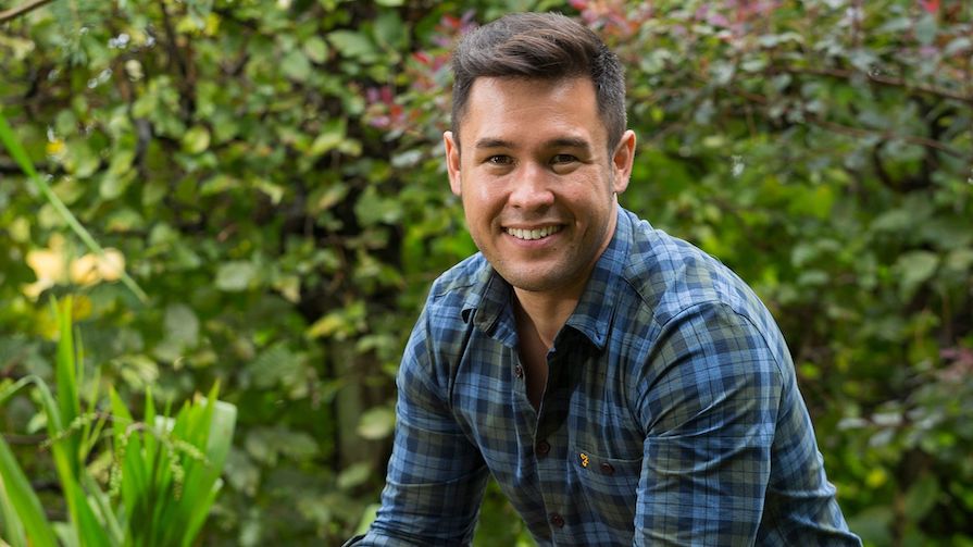 James Wong in front of trees