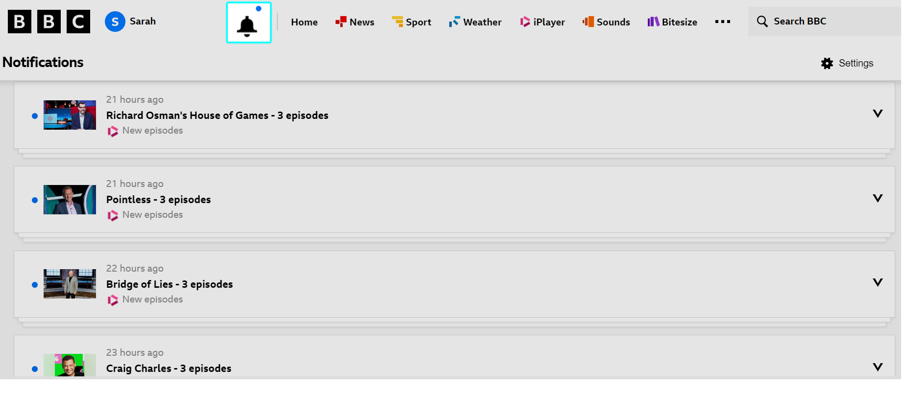 Image of the Notification menu on the BBC iPlayer website. The notification bell has a blue dot above it, and is highlighted. Both iPlayer and Sounds programmes are showing in the notification list