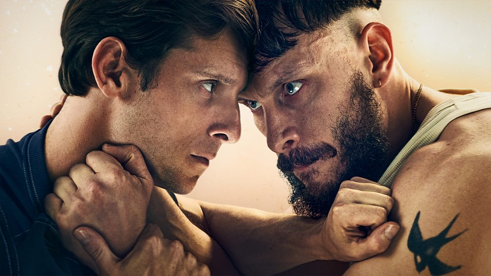 Promotional image for Half Man showing a close up of two men with their heads together looking angrily at each other, as if they are about to fight