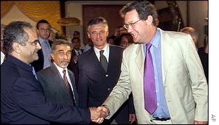 East Timorese Foreign Minister Ramos Horta, left, shakes hands with Australian counterpart Alexander Downer 