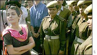 Arundhati Roy with police