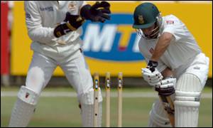 An error from Neil McKenzie costs the batsman his wicket