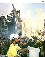 A worker sifts rubble at the Ground Zero ruins of the World Trade Center