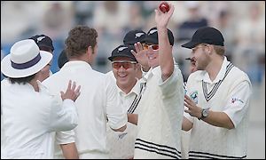 New Zealand bowler Ian Butler prepares to throw the ball back to the umpire
