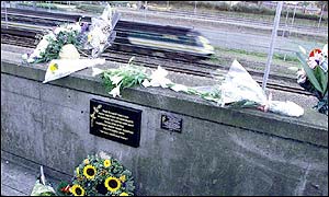 Flowers mark the spot of the Paddington crash