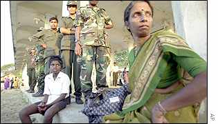 Government soldiers with Tamil civilians in northern Jaffna
