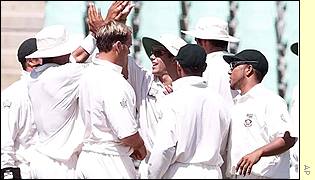 South Africa players congratulate Neil McKenzie after his catch