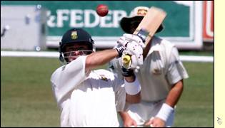 Herschelle Gibbs lofts the ball down the wicket