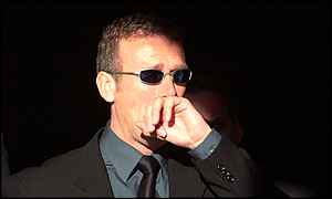 Alec Stewart leaves the memorial service for Ben Hollioake