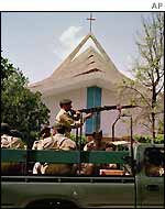 Soldiers guard a Catholic church in Islamabad
