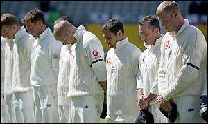 England players wear black armbands to mark the death of the Queen Mother