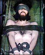 John Walker Lindh's lawyers released this picture saying it showed him in military custody, strapped to a stretcher and blindfolded