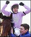 Top jockey Tony McCoy celebrates his record-breaking ride on Valfonic
