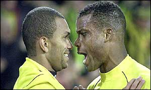 Amoroso is congratulated by Sunday Oliseh 