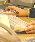 A women's hands on a keyboard