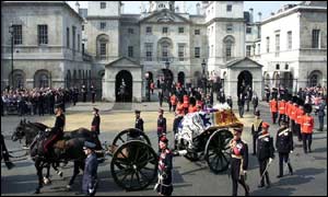 The procession passes along Whitehall