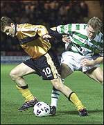 David Fernandez (left) in action against Celtic
