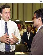 Portuguese Prime Minister Jose Manuel Durao Barroso, centre, talks to East Timorese members of Parliament 