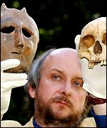 Senior archaeologist Peter Wilson with the skull and mask of the priest