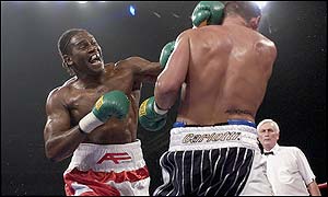 Harrison throws his full weight behind a head shot