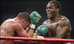 Mark Krence is forced back onto the ropes by Audley Harrison