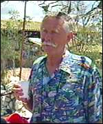 A tourists sips a drink