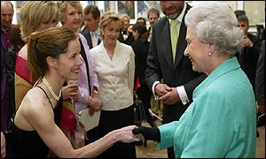 Ballerina Darcey Bussell curtsies in front of the Queen