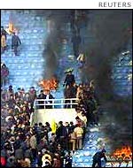 Football fans riot in Xian, March 2002
