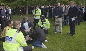 A spectator receives medial treatment following a wayward shot from Montgomerie