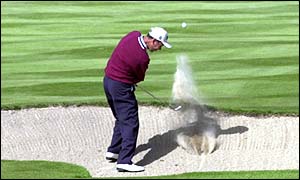 Argentina's Jorge Berendt chips out a bunker at the third