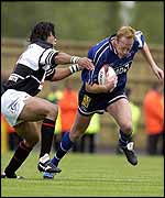 Sale's Peter Anglesea charges past Pontypridd's Richard Parks