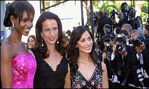 South African model Primerose Moloantoa (left), American actress Andie MacDowell and Australian singer Natalie Imbruglia 