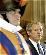 President Bush with a Vatican Swiss guard