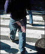 Pedestrian with American flag in pocket