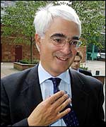 Alastair Darling arrives to start his new job at the Department of Transport