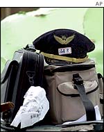A hat, positively identified by coast guards, belongs to Yi Ching-feng, the captain of the China Airlines