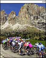 The peleton wends its way through the Dolomite mountains on the way to the finish at Passo Coe