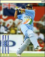 Mongia puts away a short delivery in Barbados