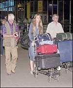 Foreigners leave Delhi's Indira Gandhi International Airport