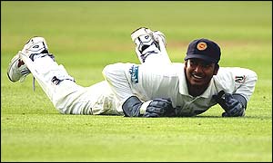 Sri Lankan wicketkeeper Kumar Sangakkara misses a catch to get rid of Graham Thorpe