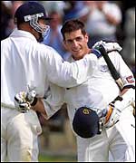 Craig White congratulates Wood on a hundred against Glamorgan