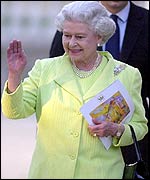 The Queen waves to wellwishers as she arrives for the classical concert