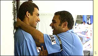 India's Virender Sehwag (right) and Zaheer Khan share a joke