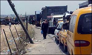 Vehicles queue at Israeli checkpoint inside Gaza