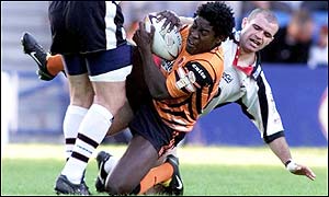 Castleford's Waine Pryce is tackled by Widnes' Barry Eaton