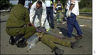 Medics attend to a Israeli soldier