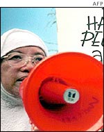 Protester outside environment meeting in Bali