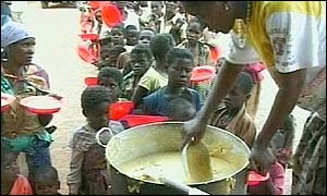 People in Malawi queuing for food