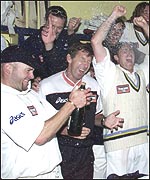 Coach Wayne Clark is caught in the middle