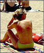 Sunbather on a Spanish beach
